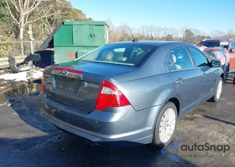 2012 Ford Fusion Hybrid z USA, uszkodzony, nr VIN 3FADP0L38CR229281
